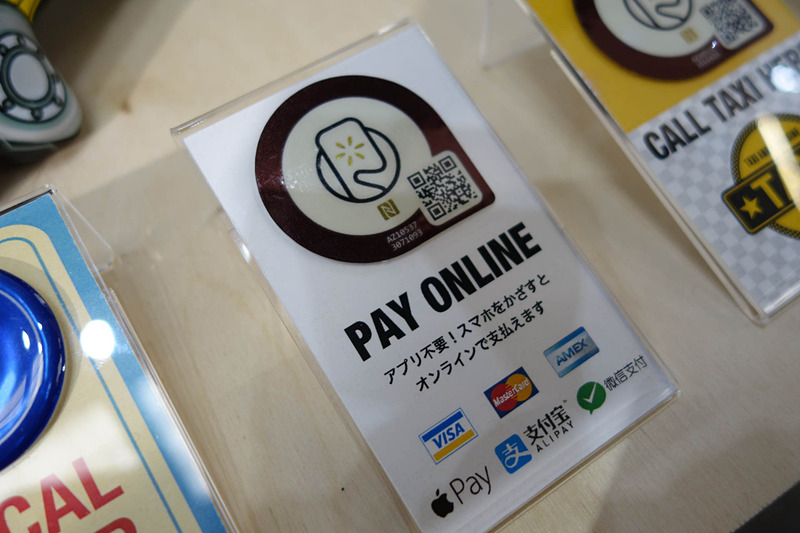 アクアビットスパイラルズのNFCタグ。要するにURLリンクだが、同社が中継サーバーを持つことでいろいろな機能を持たせている