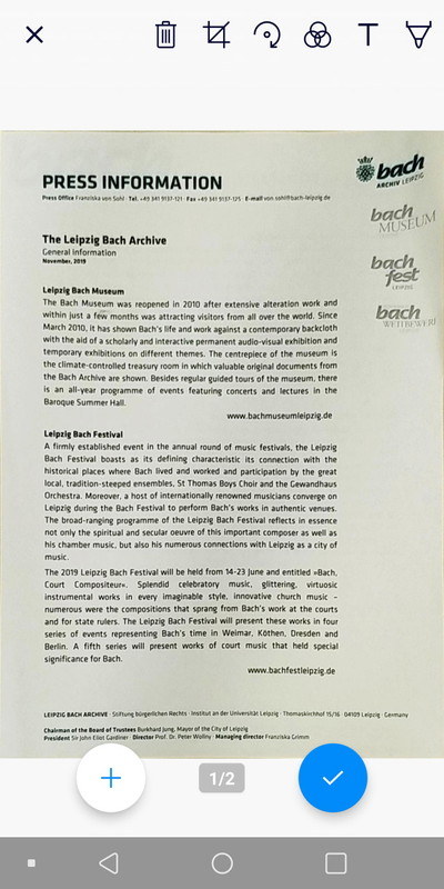 取り込み後の画面。自動で補正された画像が表示される。左下の「＋」ボタンで他のページを連続取り込みも可能