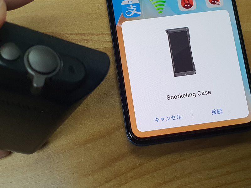 グリップの電源ボタンを押してペアリング