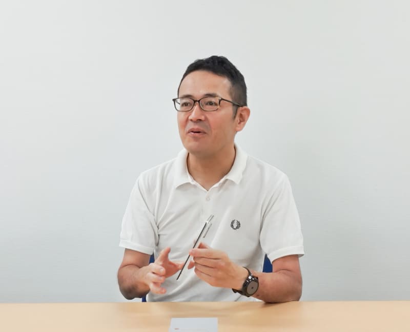 通信事業本部 パーソナル通信事業部 事業部長 小林繁氏