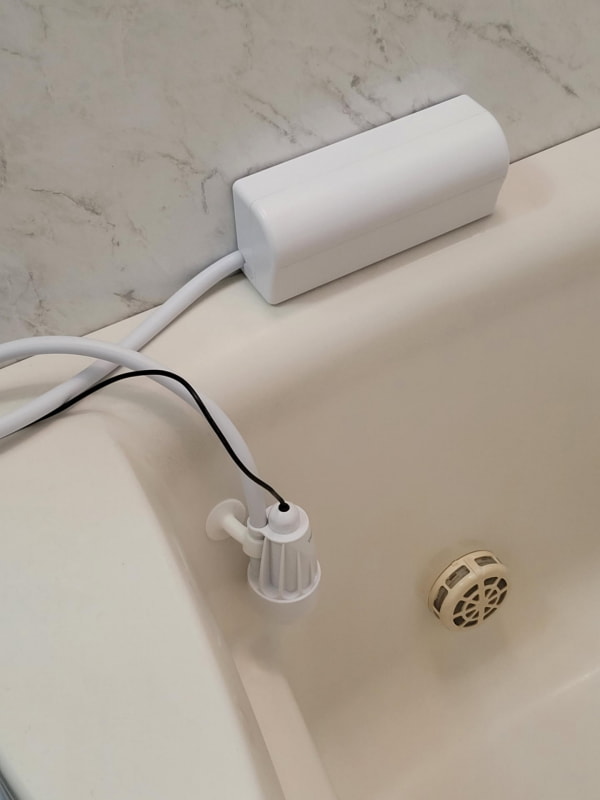 電動ポンプをお湯を張った時の水面より下に吸着設置する