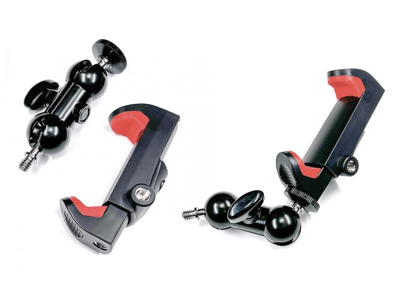 LEDリングライトにiPhoneを装着する際、LEDリングライトの中央にiPhoneのカメラレンズが来るように調整したい。中央にレンズがあると影や写り込みを最小限に抑えられるからだ。そのために、こういった小さなアーム（マジックアームなどの名称で市販されている）やスマートフォンホルダー（三脚ネジ穴付き）を使用している。アームやホルダーはそれぞれ1000円前後で手に入る（写真のものはマンフロット製ホルダーで1500円くらい）。<a href="https://www.amazon.co.jp/dp/B08B82PMKL/" class="strong b">写真のアームはAmazonのコレ</a>で、918円だった。