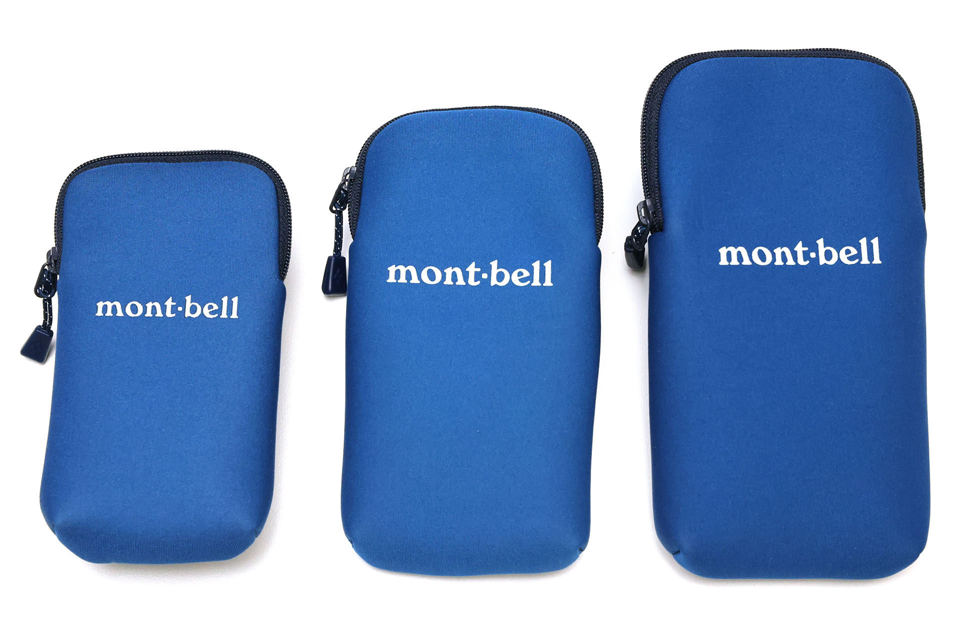 S/M/Lの3サイズがある。Sの対応スマートフォンサイズは高さ138×幅67×厚さ7mm、Mの対応スマートフォンサイズは高さ158×幅78×厚さ7mm、Lの対応スマートフォンサイズは高さ165×幅85×厚さ9mm。モンベルオンライショップ税込価格は、Sが2,420円、Mが2,530円、Lが2,640円。