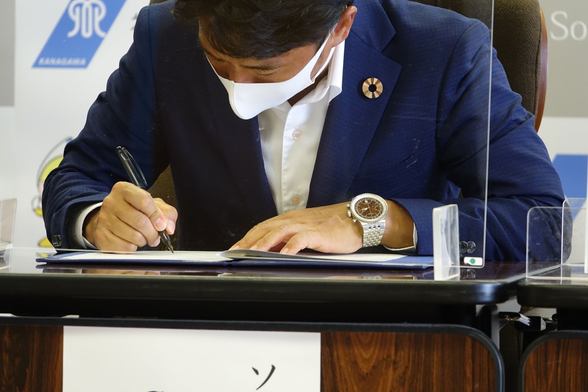 協定締結のようす