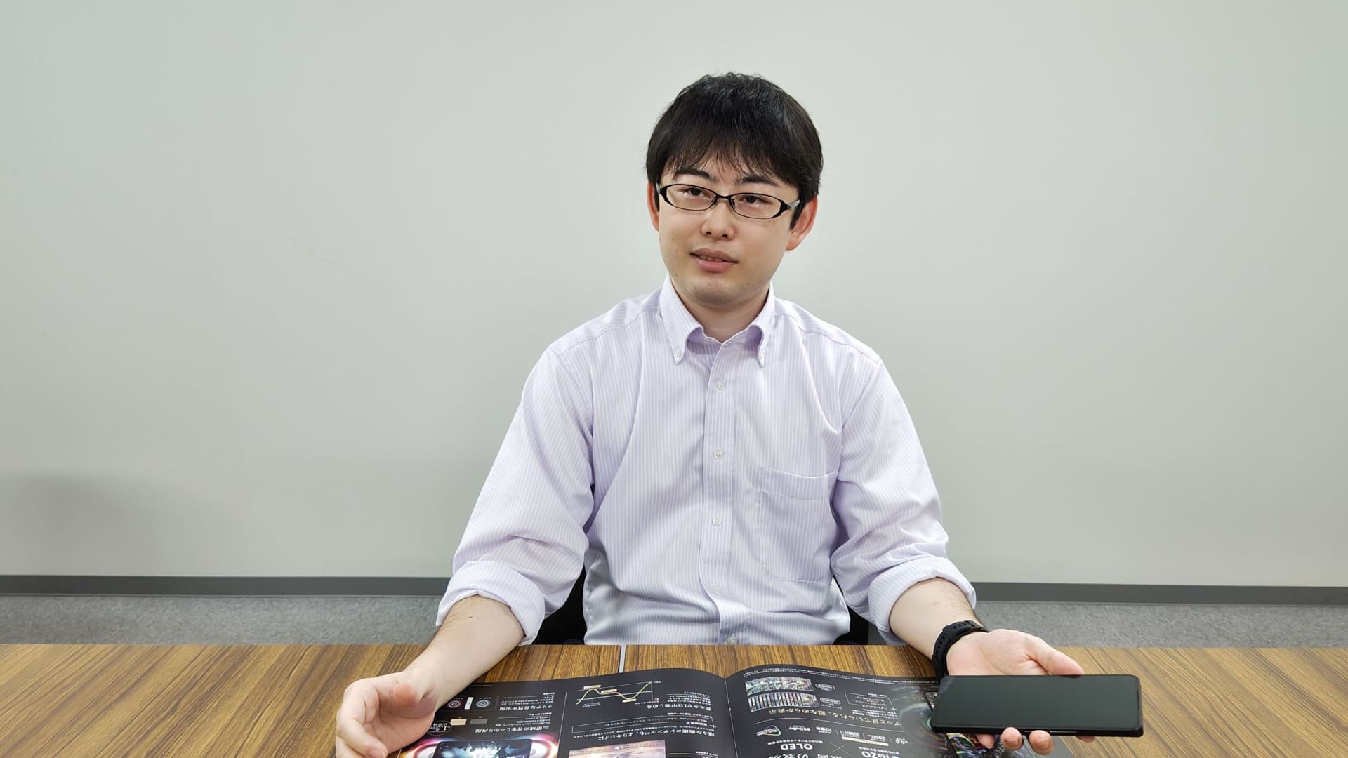 システム開発部の技師の岡坂氏