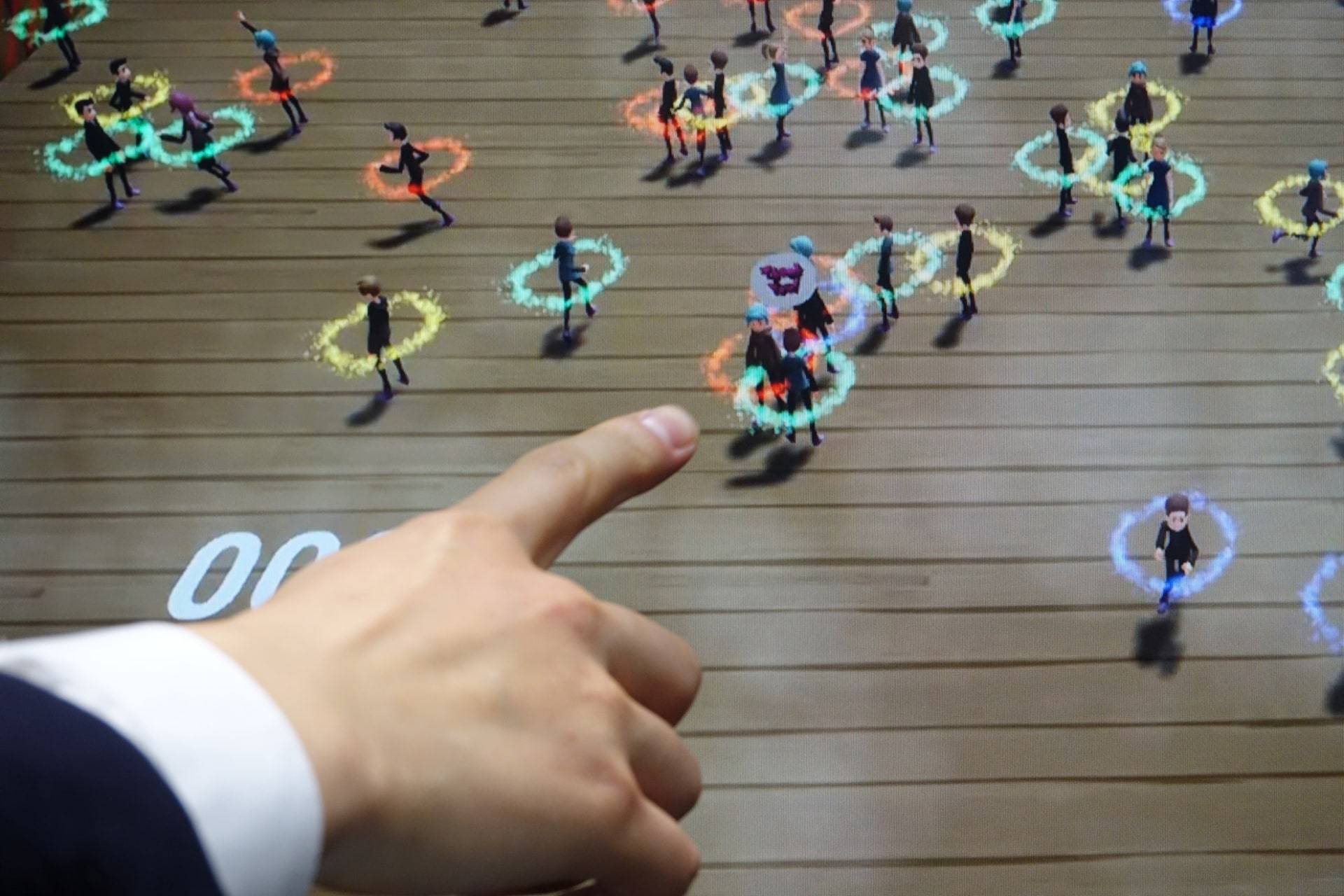 自分のアバター（指で示している）から、アクションを出しているところ