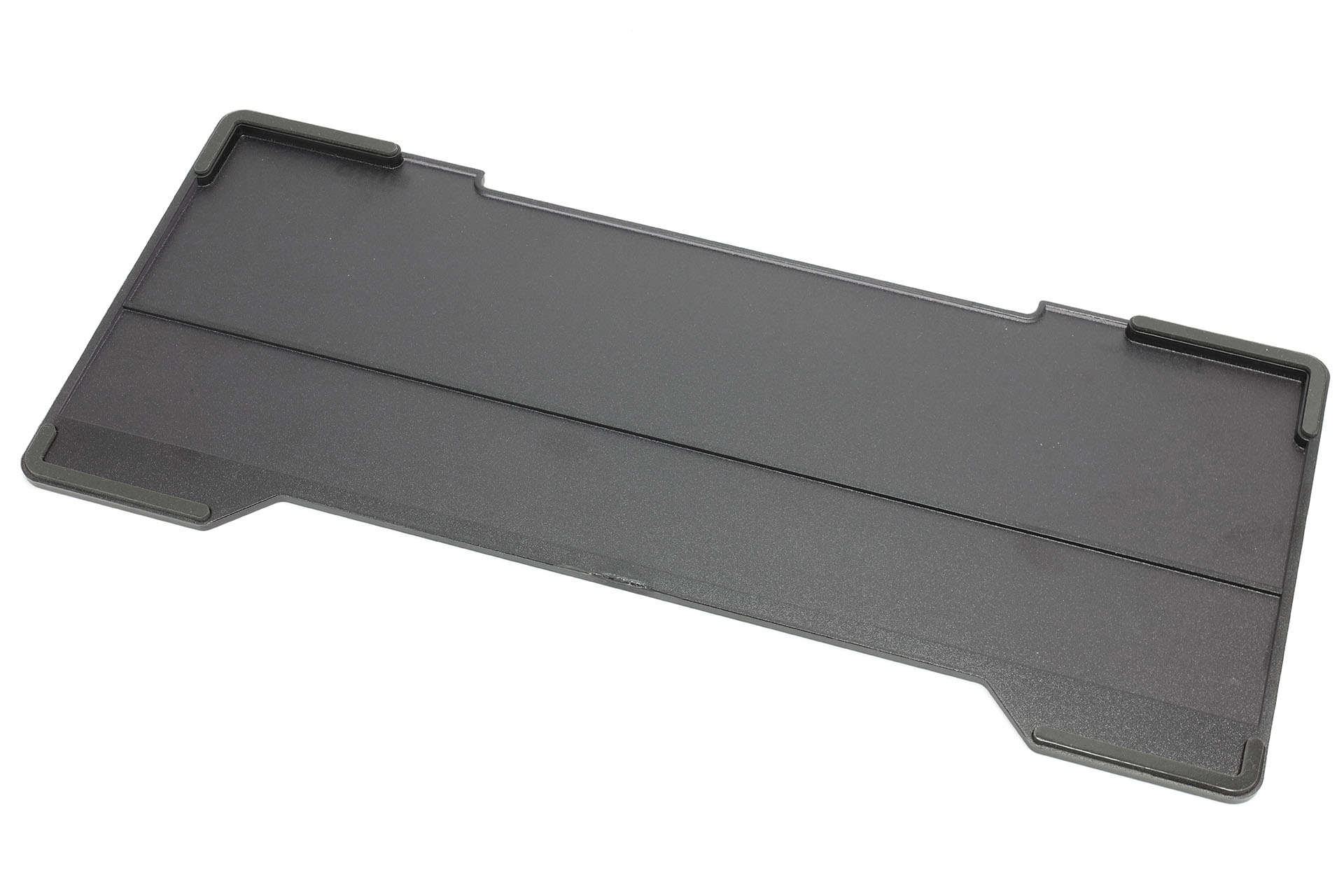 キーボードブリッジの裏面には4つの滑り止めがある。これがMacBookのキーボードの少し外側に着地する。