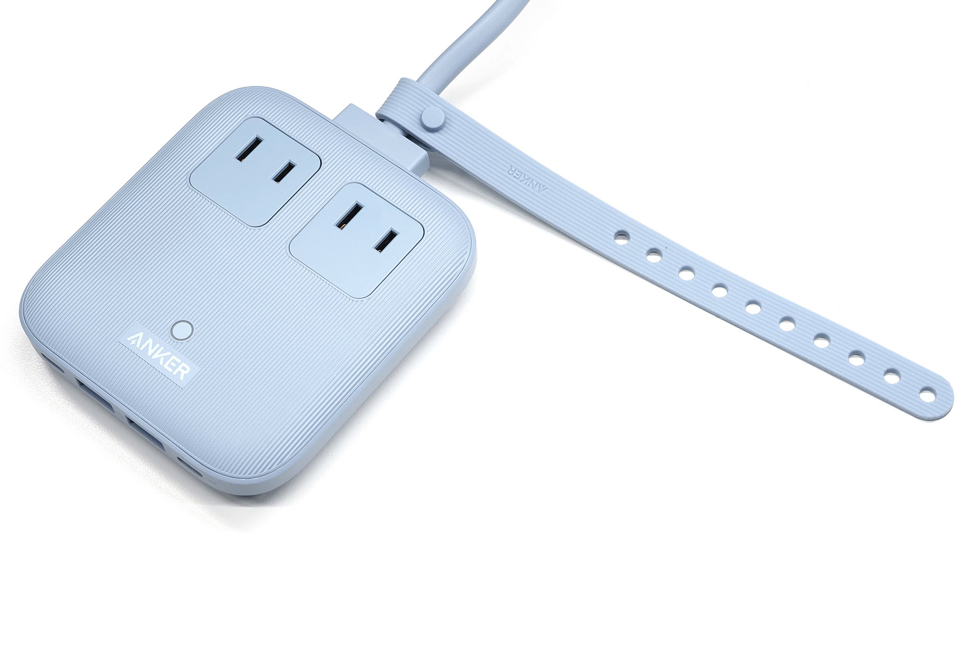 こんなシリコンバンド。ACケーブルに装着したときの長さは約18cm。