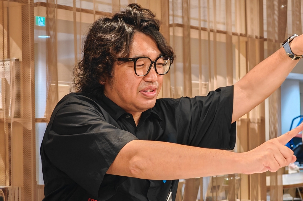 石野氏