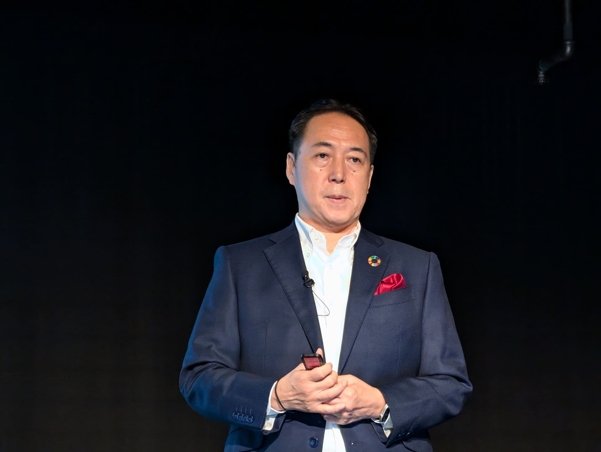 料金改定の理由を語る寺尾氏