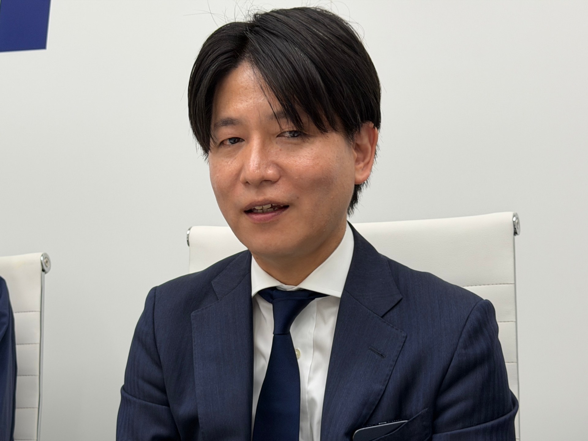 KDDI コア技術統括本部 技術企画本部 副本部長の佐藤卓郎氏