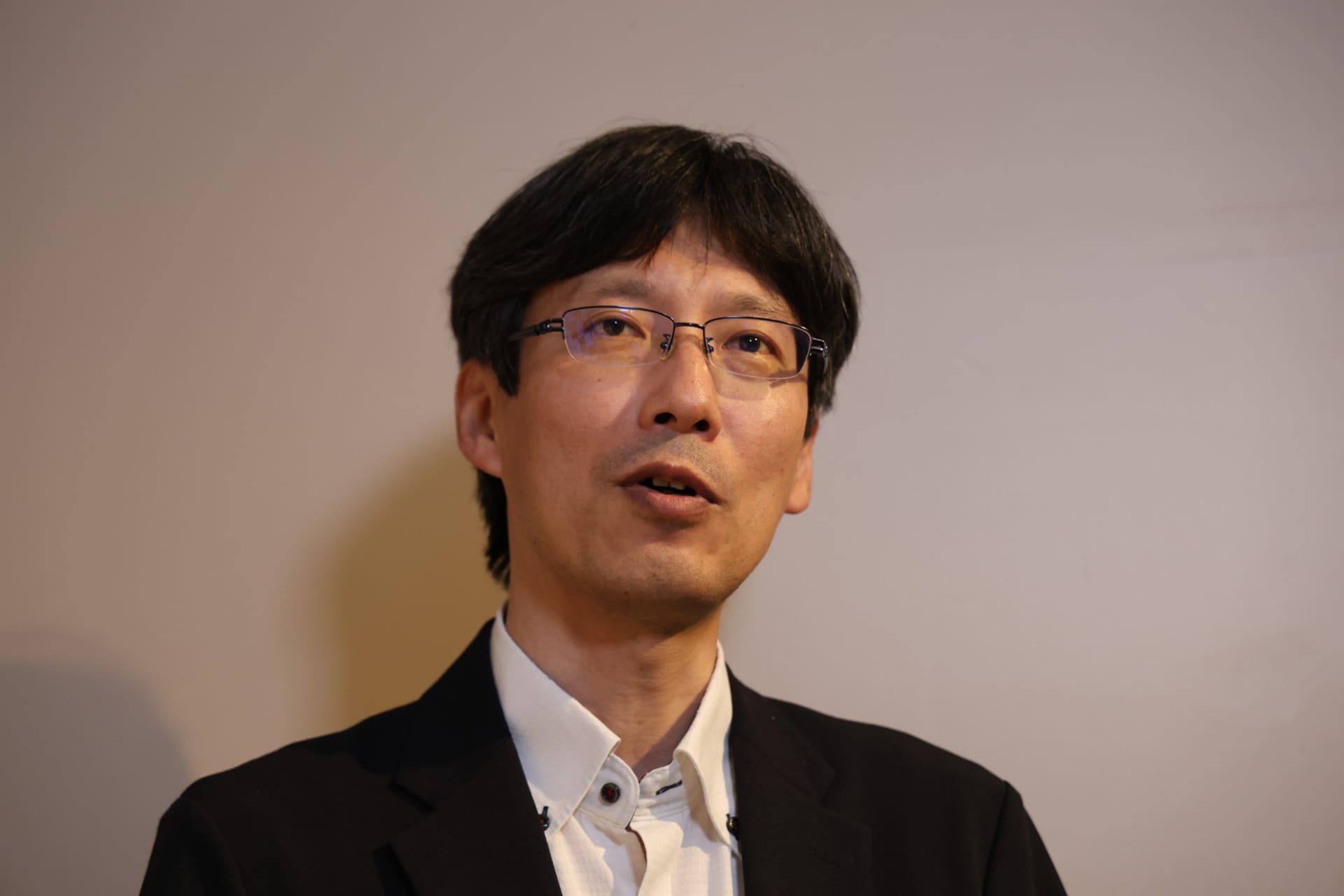 KDDI先端技術統括本部先端技術企画本部システム戦略部長の高田潤氏