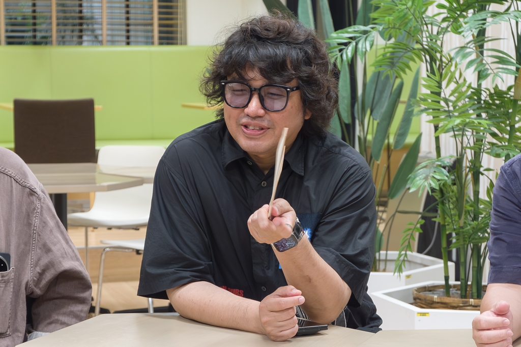 石野氏