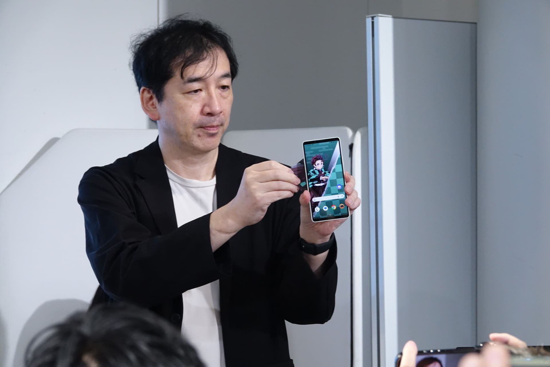 「鬼滅の刃」デザインのFan Syncカードを適用する様子。鬼滅の刃デザインカードは2種類ある
