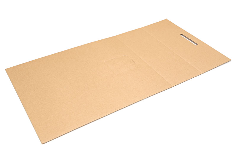 背景紙を机上にセットするためのスタンド（背景紙台）。ダンボール製で組み立て式。付属のクリップで背景紙を留める