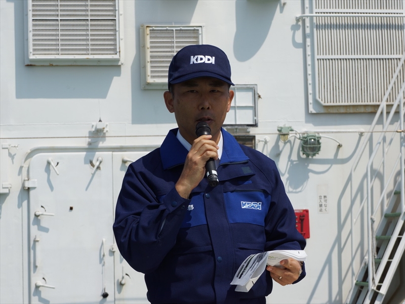 KDDI 運用品質管理部 高井久徳部長は、KDDIの災害対策に対する取り組みや実証実験の背景を説明