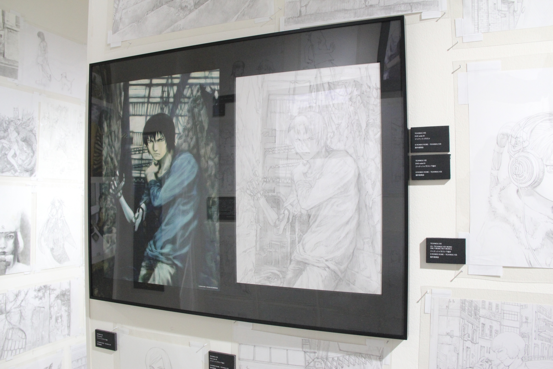 「TEXHNOLYZE」の展示エリアは少々小さめだが、ジャケット用のカラーイラストなどを間近で鑑賞できる。渋いイラストが多く、おっさん好きにはたまらない