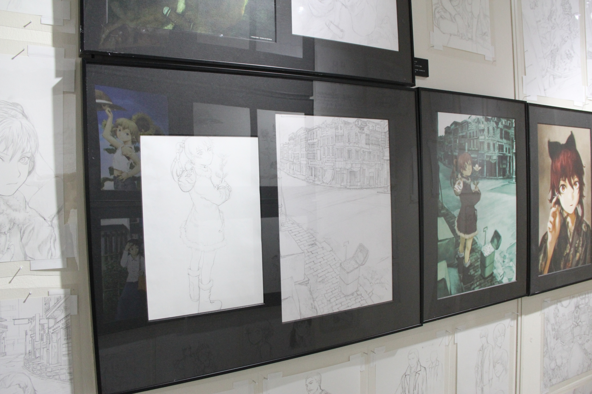 「TEXHNOLYZE」の展示エリアは少々小さめだが、ジャケット用のカラーイラストなどを間近で鑑賞できる。渋いイラストが多く、おっさん好きにはたまらない