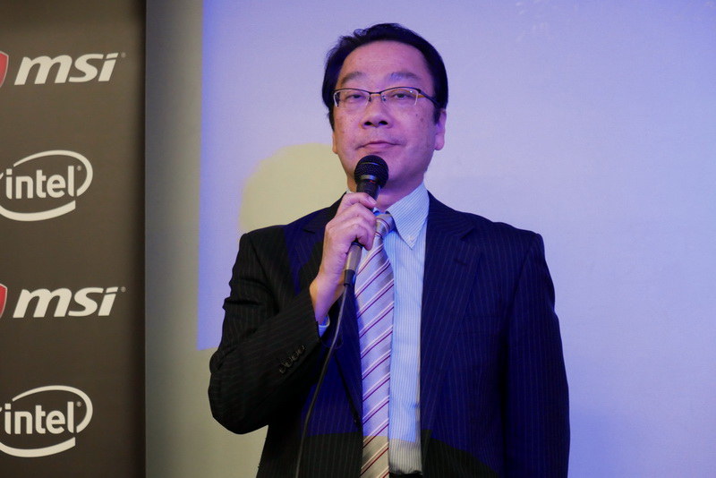 挨拶とMSI製品の魅力を解説する、キヤノンマーケティングジャパン株式会社 主席の村中恒夫氏