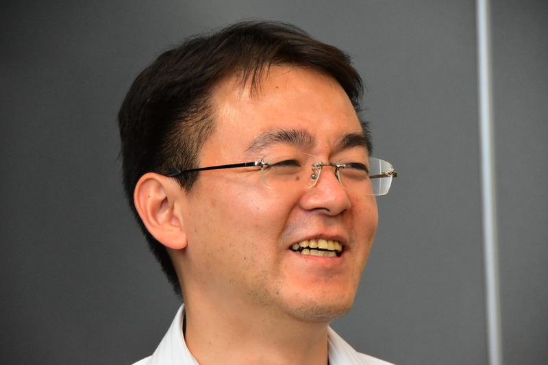 日浅好則氏(同コンシューマ事業本部コンシューマビジネス事業部第三技術部シニアマネージャ)