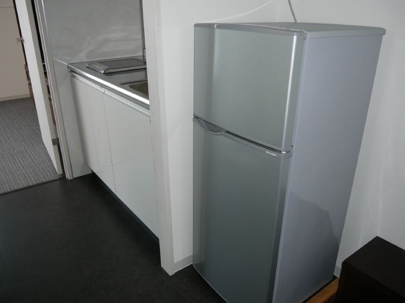 誠意館のVIPルーム。役員や本部長以上の役職者、鴻海グルーブの出張者、取引先の社員などが入居したり、臨時宿泊ができる。洗濯機や冷蔵庫も設置されている