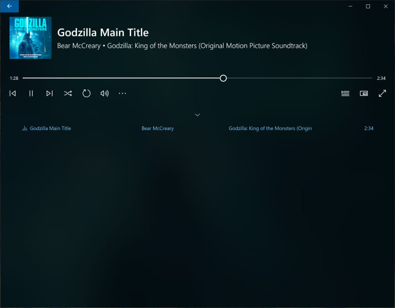 再生中の画面。画面はシンプルで、下部にはプレイリストが表示される構成。こちらもOSに合わせた画面デザインだ。