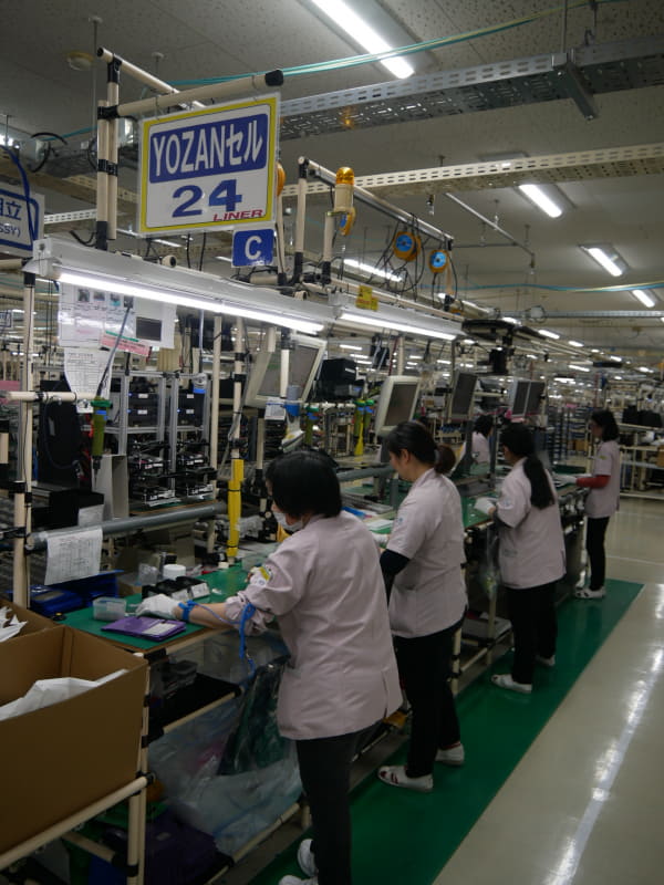 24番の生産ラインの看板には、「C」という文字が書かれているが、これは熟練者だけで構成されるチャンピオンラインを意味する