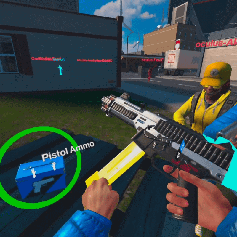 金色に光るマガジンをもう片方のコントローラーのグリップボタンでつかみ、銃に装着する