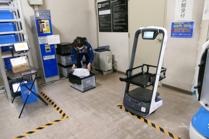 このような仕組みにより物流事業者の館内滞留時間を最少化する