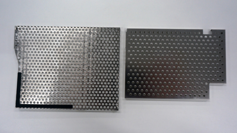 LTEモジュールのためのノイズシールドとなるシールドカンは、パンチ穴を増やしつつ本来のシールドとしての機能を両立させている。左側が今回のVAIO SX14のもので、パンチの目がより細かいことが分かる<br>※写真提供：VAIO株式会社