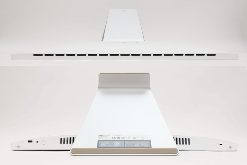 本体上面(上)と本体下面(下)。スタンド底面にはシリアルナンバーや認証情報が記載されている