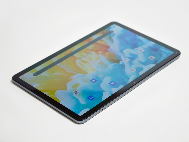 上側面にSIM/microSDカードスロットとスピーカー×2。右側面には何もない