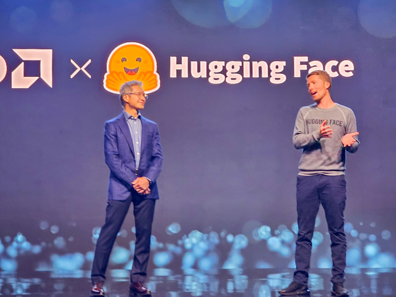 AMD 社長 ビクター・ペン氏(左)とHugging Face CEO クレメント・デランジュ氏