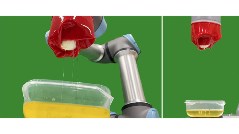 オリーブオイルタンクから浸したゆで卵の把持の様子