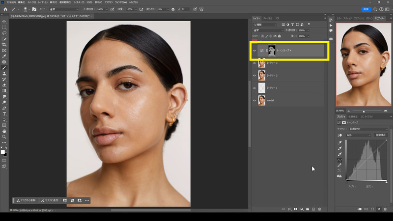 選択範囲ができている状態で調整レイヤーのトーンカーブを作ります。選択範囲がある状態で調整レイヤーを作ると選択範囲がレイヤーマスクに反映された調整レイヤーができます