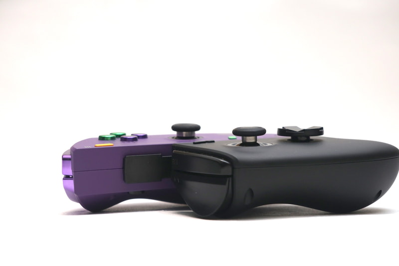 アナログスティックの軸が細くなり、可動領域が増した