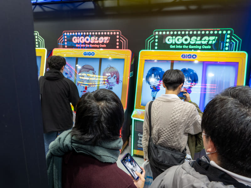 ノベルティのポストカードがもらえるスロット台を設置した