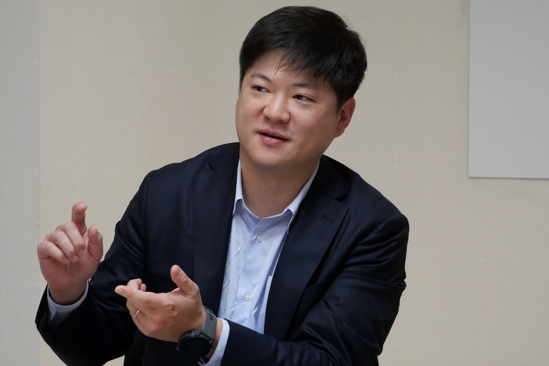 AUS Japan株式会社システムビジネスグループ コンシューマービジネス事業部 統括部長のデイビッド・チュー氏