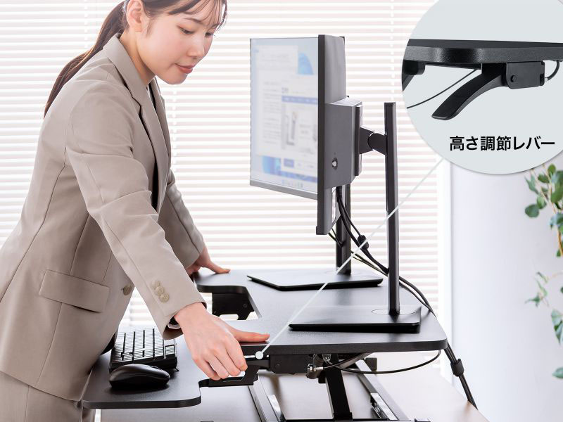 昇降操作は天板両端のレバーで行なう