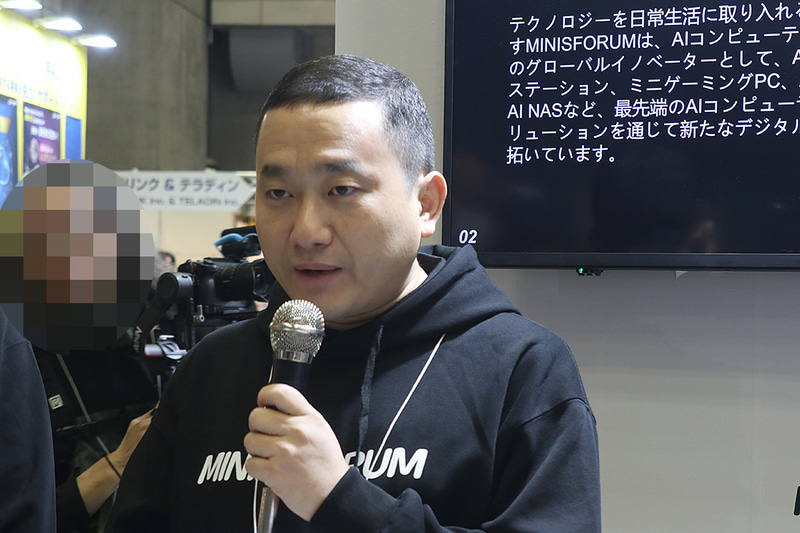 靳(きん)輝(Michael Jin)氏