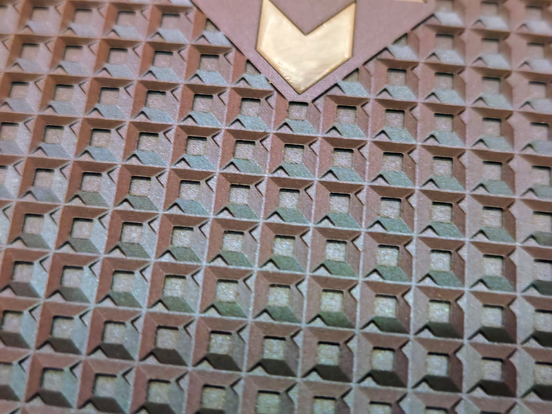 格子柄をよく見ると、AMDロゴ