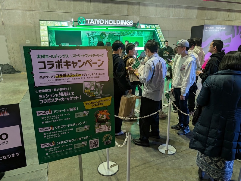 太陽ホールディングスのブース。今回はアンケートに回答したり、クロスワードにチャレンジすることで、最大3枚までユニークなコラボステッカーがもらえるキャンペーンを実施。インターバルなどの空き時間は常に行列ができて賑わいを見せていた