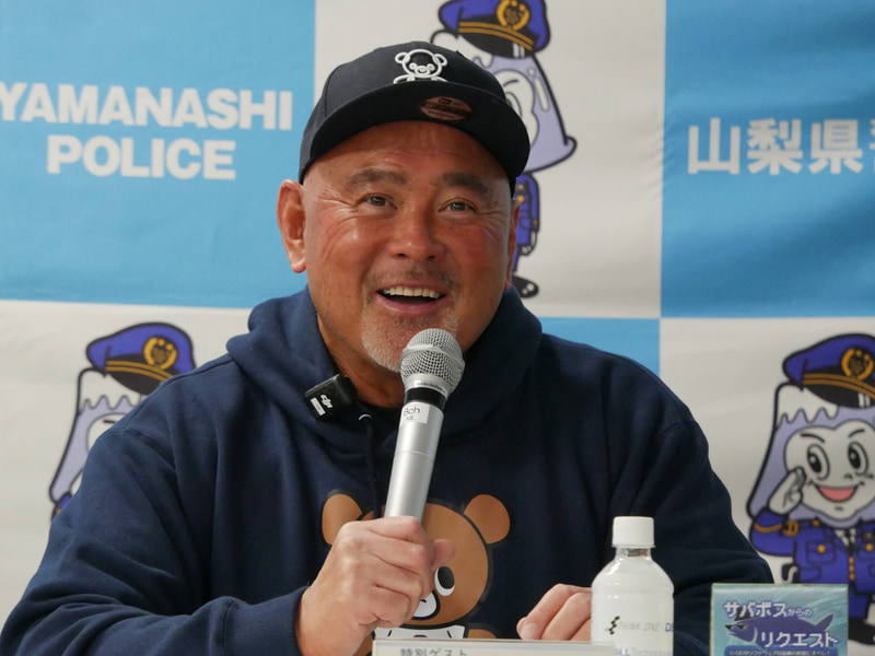 イベントでは来場者の質問に笑顔で答えるシーンも。引退試合のエピソード、日々のトレーニング、長州力氏の滑舌の悪さなど、話題はサイバーセキュリティ以外に広がった