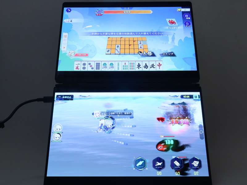 上画面で「雀魂」のイベントをプレイしつつ、下画面で「アズールレーン」のイベント海域周回を同時実行中。「アズールレーン」の周回は自動操作なので、こちらは上画面の「雀魂」のイベントプレイにのみ集中すれば済むのでかなり効率よくプレイできる