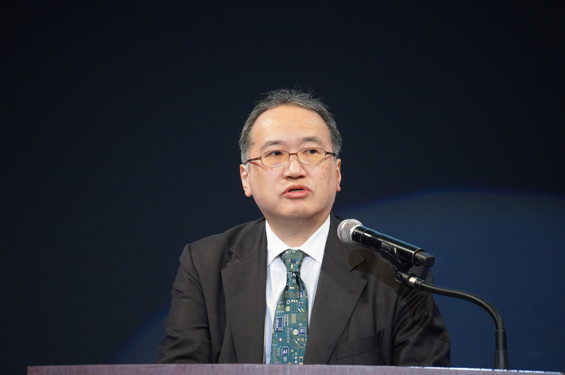 経産省のイベント「我が国のフィジカルAI政策に関する対外発信イベント」でスピーチする経済産業省 商務情報政策局長 野原諭氏