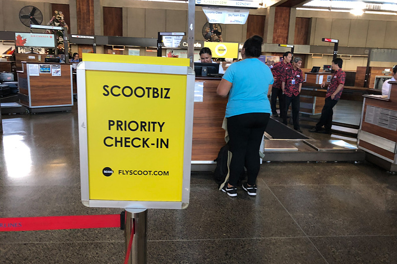 スクートビズのカウンターへ向かって、アップグレードしたいと申し出た