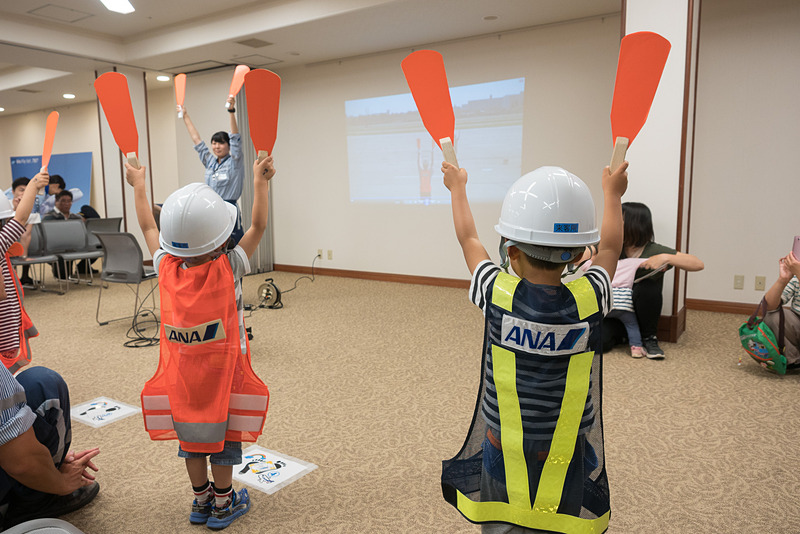 マーシャラー視点のビデオを使った体験コーナー。この整理券は随時配布しており、イラストがかわいいイラストボードで、次に体験できる整理券番号を告知するスタイル