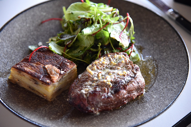 「AACO Darling Downs Wagyu7 + scotch fillet 300g, potato and eggplant gratin, French mustard butter」