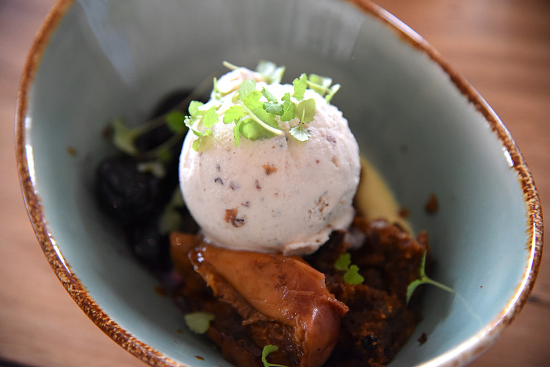 「Christmas cake, vanilla sherry custard, charred peaches, rum & raisin ice cream」