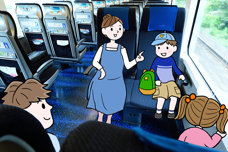 座席を回してゆったり旅気分で都心へ